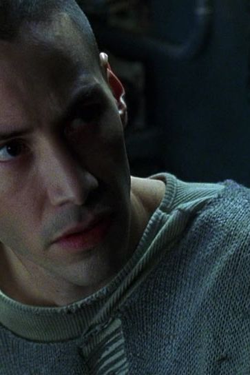 The Matrix is the ultimate example of grungy knitwear in the dystopian age. Part of that is to contrast with the shiny outfits everyone wears inside the Matrix; part of that is to signify the capacity for human culture to decay; and part of that is because when Keanu Reeves wears a torn shirt, you just want to help him.