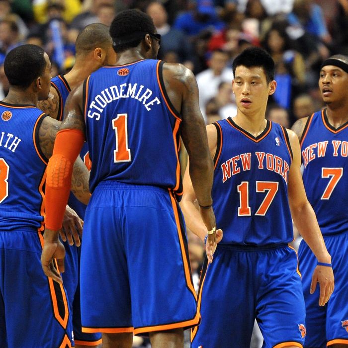 Jeremy Lin #17 of the New York Knicks is congratulated by teammate Amare Stoudemire #1