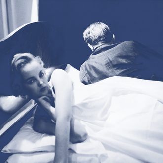 30th October 1954: A couple in a failed marriage lie back to back on their bed. Original Publication: Picture Post - 7373 - Why Marriage Can Fail - pub. 1954 (Photo by Thurston Hopkins/Picture Post/Getty Images)