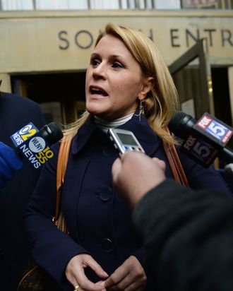 Canadian actress Genevieve Sabourin, accused of stalking actor Alec Baldwin, talks to the media outside Manhattan Criminal Court November 12, 2013 in New York. 