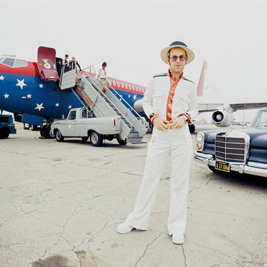 John arrives on his private jet for the historic concert series at Dodger Stadium.