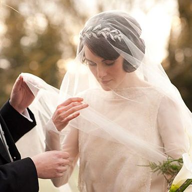 Downton's biggest fashion moment will always be Sybil's jaunty harem pants, but Mary's simple wedding dress (well, as simple as something with a train can be) is a close second.