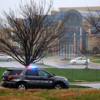 OVERLAND PARK, KS - APRIL 13: A police vehicle sits in front of the Jewish Community Center after three were killed when a gunman opened fire on April 13, 2014 in Overland Park, Kansas. Police arrested and are questioning a suspect. (Photo by Jamie Squire/Getty Images)