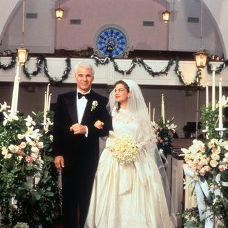 Steve Martin walking down the aisle with Kimberly Williams-Paisley in a scene from the film 'Father Of The Bride', 1991.