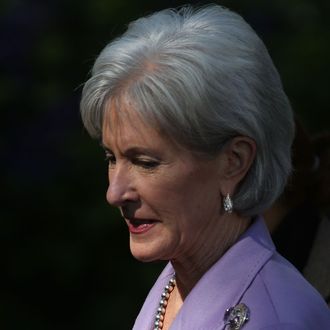 WASHINGTON, DC - OCTOBER 21: Health and Human Services Secretary Kathleen Sebelius arrives to listen to U.S. President Barack Obama speak about the error-plagued launch of the Affordable Care Act's online enrollment website in the Rose Garden of the White House October 21, 2013 in Washington, DC. According to the White House, the president was joined by 'consumers, small business owners, and pharmacists who have either benefitted from the health care law already or are helping consumers learn about what the law means for them and how they can get covered. 'Despite the new health care law's website problems, Obama urged Americans not to be deterred from registering for Obamacare because of the technological problems that have plagued its rollout. (Photo by Mark Wilson/Getty Images)