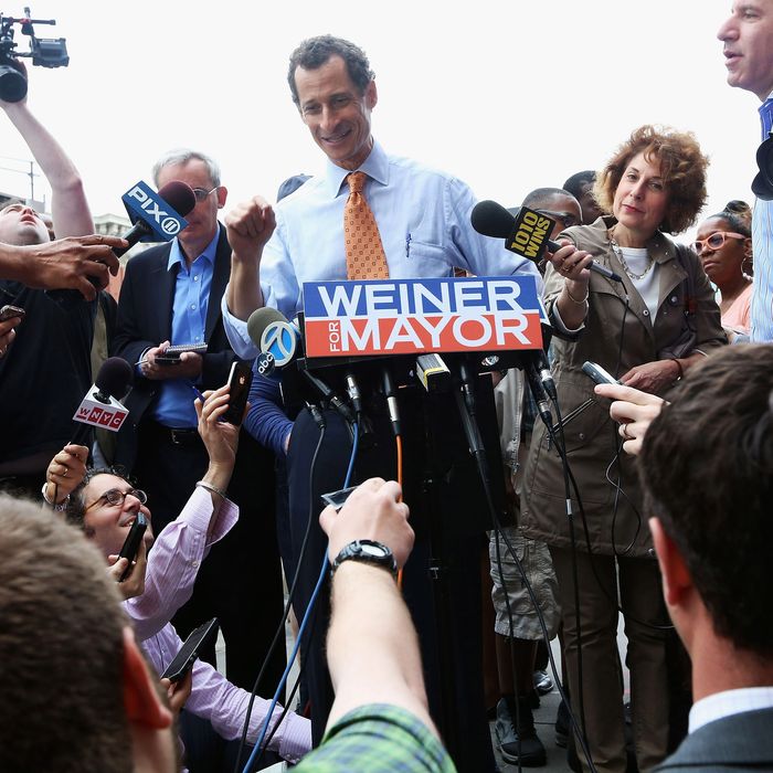 NEW YORK, NY - MAY 23: Anthony Weiner (C) speaks to the media after courting voters outside a Harlem subway station a day after announcing he will enter the New York mayoral race on May 23, 2013 in New York City. Weiner is joining the Democratic race to succeed three-term Mayor Michael Bloomberg after he was forced to resign from Congress in 2011 following the revelation of sexually explicit online behavior. (Photo by Mario Tama/Getty Images)