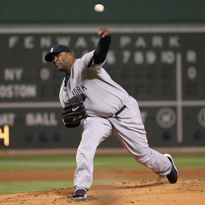 BOSTON, MA - APRIL 10: CC Sabathia #52 of the New York Yankees throws against the Boston Red Sox at Fenway Park April 10, 2011 in Boston, Massachusetts. (Photo by Jim Rogash/Getty Images)