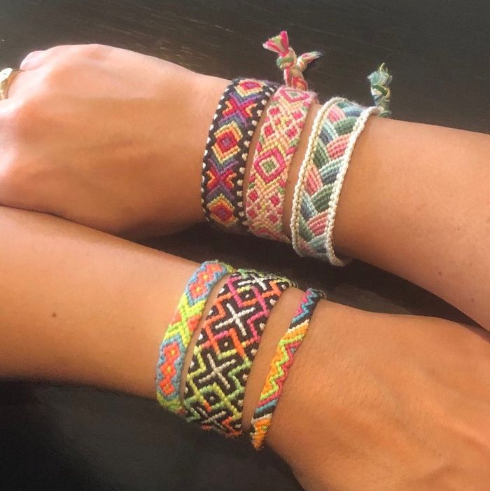 arm full of friendship bracelets