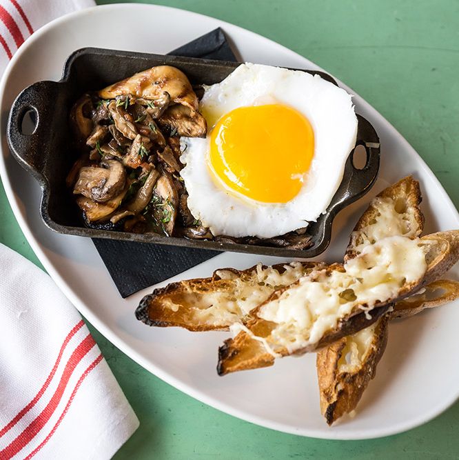 Weitzman's Hudson Valley duck egg with grilled mushrooms, and smoked Pecorino toast.