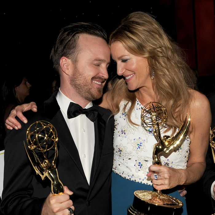 LOS ANGELES, CA - AUGUST 25: Actors Aaron Paul (L), winner of the award for Outstanding Supporting Actor in a Drama Series, and Anna Gunn, winner of the award for Outstanding Supporting Actress in a Drama Series, for the show 'Breaking Bad', attend the 66th Annual Primetime Emmy Awards Governors Ball held at Los Angeles Convention Center on August 25, 2014 in Los Angeles, California. (Photo by Kevin Winter/Getty Images)