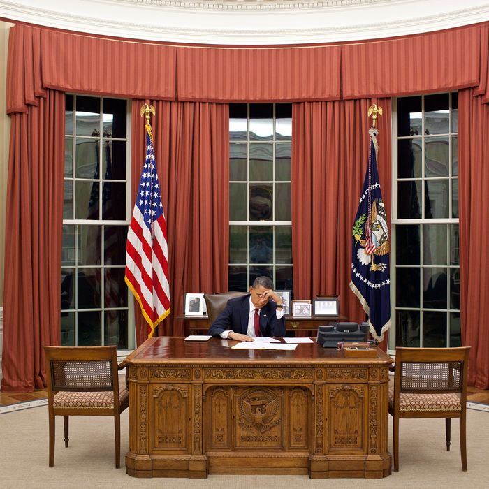 President Barack Obama edits his remarks in the Oval Office prior to making a televised statement detailing the mission against Osama bin Laden
