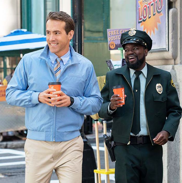 Ryan Reynolds and Lil Rel Howery in Free Guy.