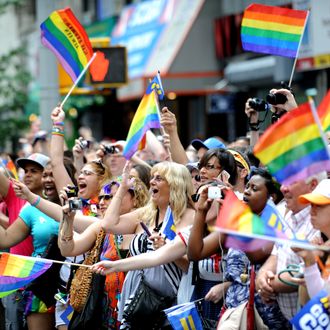 Spectators cheer during the New York City gay pride march June 26, 2011.