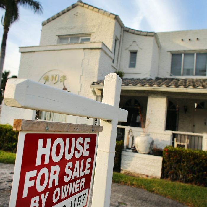 A 'For Sale' sign is posted in front of a house on November 28, 2012 in Hollywood, Florida. 