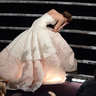 HOLLYWOOD, CA - FEBRUARY 24: Actress Jennifer Lawrence reacts after winning the Best Actress award for 