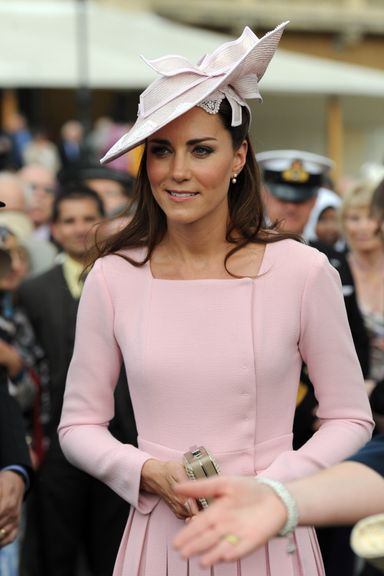 LONDON, UNITED KINGDOM - MAY 29:  Catherine, Duchess of Cambridge meets guests during a garden party at Buckingham Palace on May 29, 2012 in London, England. (Photo by Anthony Devlin - WPA Pool /Getty Images)