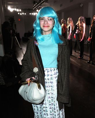 That blue wig is one of the things that was in her locker. We wonder if it violates her high school's dress code.