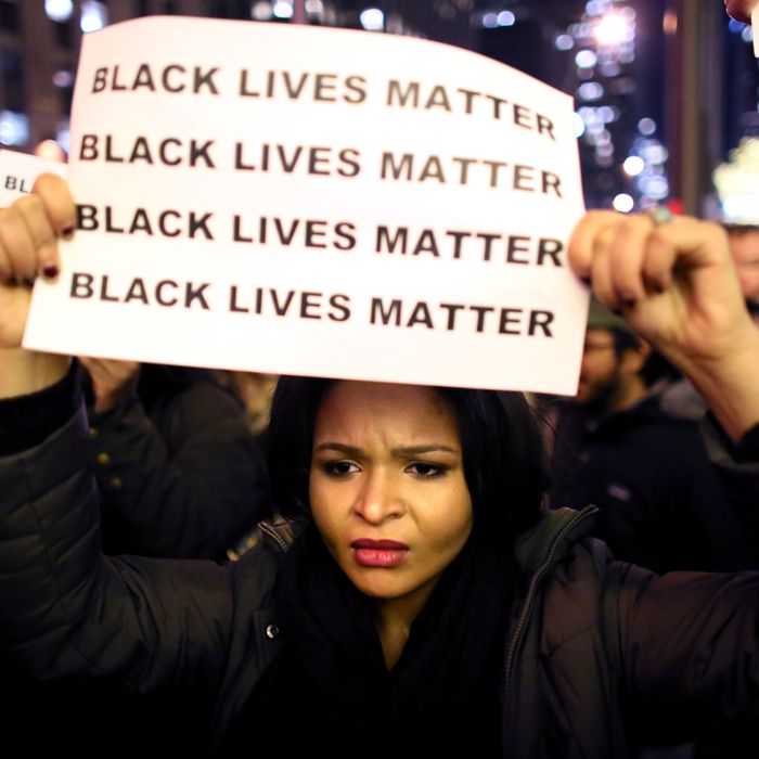 NEW YORK - DECEMBER 3: Demonstrators walk together during a protest December 3, 2014 in New York. Protests began after a Grand Jury decided to not indict officer Daniel Pantaleo. Eric Garner died after being put in a chokehold by Pantaleo on July 17, 2014. Pantaleo had suspected Garner of selling untaxed cigarettes. (Photo by Yana Paskova/Getty Images)