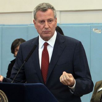 (L-R) New York City Mayor Bill De Blasio, Tameeka Ford Norville, Director of Programming, Ingersoll Community Center and New York City Council Member Laurie Cumbo and NYPD Commissioner Bill Bratton attends Mayor Bill De Blasio's Press Conference to launch $130 Million Plan to reduce crime, reduce number of people with behavioral & mental health issues behind bars and also announces the city's latest crime numbers also outlines the administration's work to strengthen the relationship between police and community on December 2, 2014 in at the Ingersoll Houses Brooklyn, New York. 