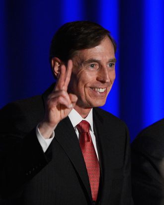 LOS ANGELES, CA - MARCH 26: Former CIA director and retired four-star general General David Petraeus applauds as he makes his first public speech since resigning as CIA director at University of Southern California dinner for students Veterans and ROTC students on March 26, 2013 in Los Angeles, California. Petraeus apologized in his speech for his actions that lead to him resigning from the CIA. (Photo by Kevork Djansezian/Getty Images)