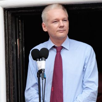 Wikileaks founder Julian Assange is seen on the balcony of the Equador embassy in Knightsbridge on August 19, 2012 in London, England.