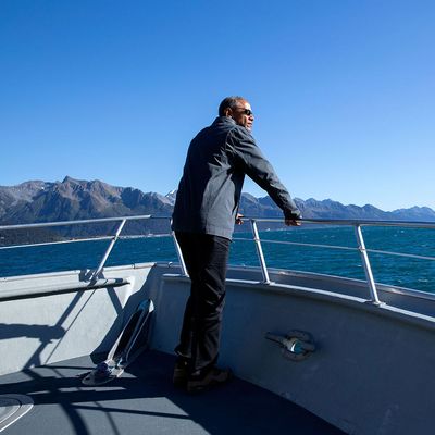 The President tours Kenai Fjords National Park in Alaska by boat. 