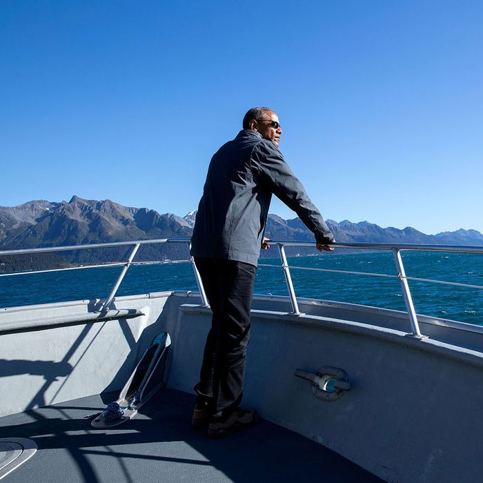 The President tours Kenai Fjords National Park in Alaska by boat.