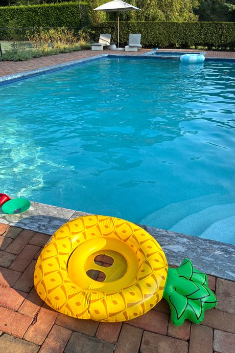 Overhead view of a pineapple shaped pool float for little kids from Big Mouth.