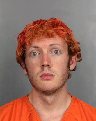 In this handout provided by the Arapahoe County Sheriff's Office, accused movie theater shooter James Holmes poses for a booking photo on an unspecified date in Centennial, Colorado. According to police, Holmes killed 12 people and injured 58 others during a shooting rampage at an opening night screening of 