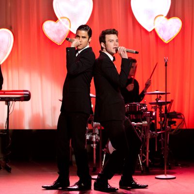 GLEE: Blaine (Darren Criss, L) and Kurt (Chris Colfer, R) perform at Will and Emma's wedding in the 
