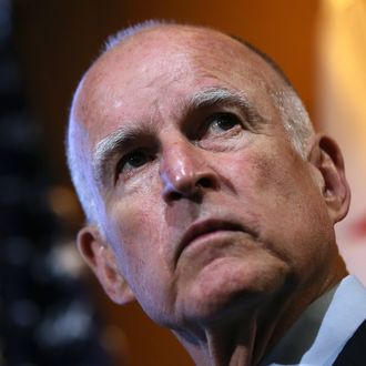 MOUNTAIN VIEW, CA - SEPTEMBER 25: California Gov. Jerry Brown looks on during a news conference at Google headquarters on September 25, 2012 in Mountain View, California. California Gov. Jerry Brown signed State Senate Bill 1298 that allows driverless cars to operate on public roads for testing purposes. The bill also calls for the Department of Motor Vehicles to adopt regulations that govern licensing, bonding, testing and operation of the driverless vehicles before January 2015. (Photo by Justin Sullivan/Getty Images)