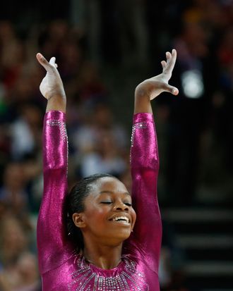 US gymnast Gabrielle Douglas performs on the floor during the artistic gymnastics women's individual all-around final at the 02 North Greenwich Arena in London on August 2, 2012 during the London 2012 Olympic Games. Douglas won the event.