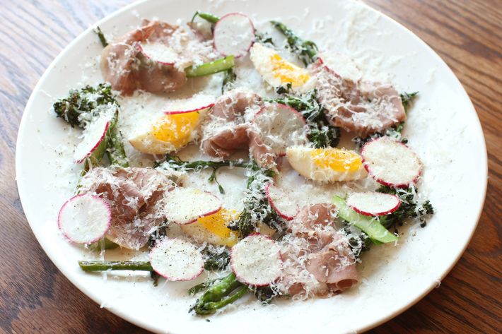 Momofuku Ssam Bar's broccolini with koji beef tongue, egg, and manchego.