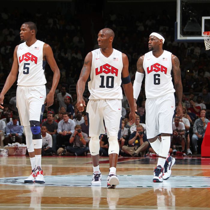 Kevin Durant #5, Kobe Bryant #10 and LeBron James #6 of the USA Men's Senior National Team during a break against Brazil at the Verizon Center on July 16, 2012 in Washington, DC.
