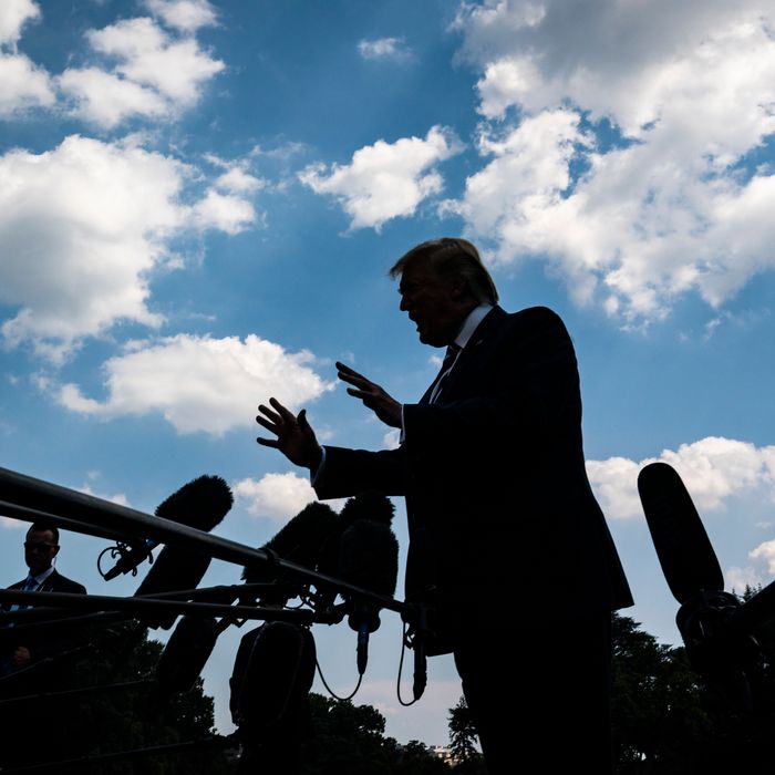 President Donald J. Trump stops to talk to reporters and members of the media as he walks from the Oval Office to board Marine One to depart from the South Lawn at the White House.