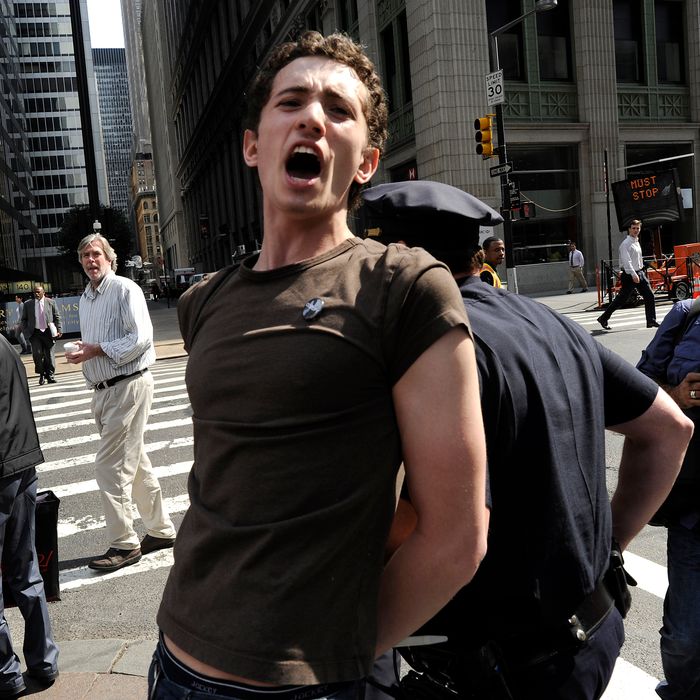 A demonstrator with 'Occupy Wall Street' is arrested during a protest at Zuccotti Park in New York on March 23, 2012 .