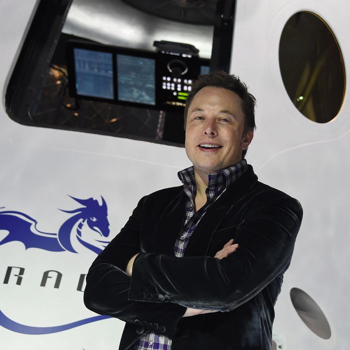 SpaceX CEO Elon Musk introduces SpaceX's Dragon V2 spacecraft, the companys next generation version of the Dragon ship designed to carry astronauts into space, at a press conference in Hawthorne, California on May 29, 2014. The private spaceflight companys unmanned Dragon spacecraft has been delivering cargo to the International Space Station three times since 2012. The new Dragon V2 will ferry NASA astronauts to and from the space station. AFP PHOTO / Robyn Beck (Photo credit should read ROBYN BECK/AFP/Getty Images)