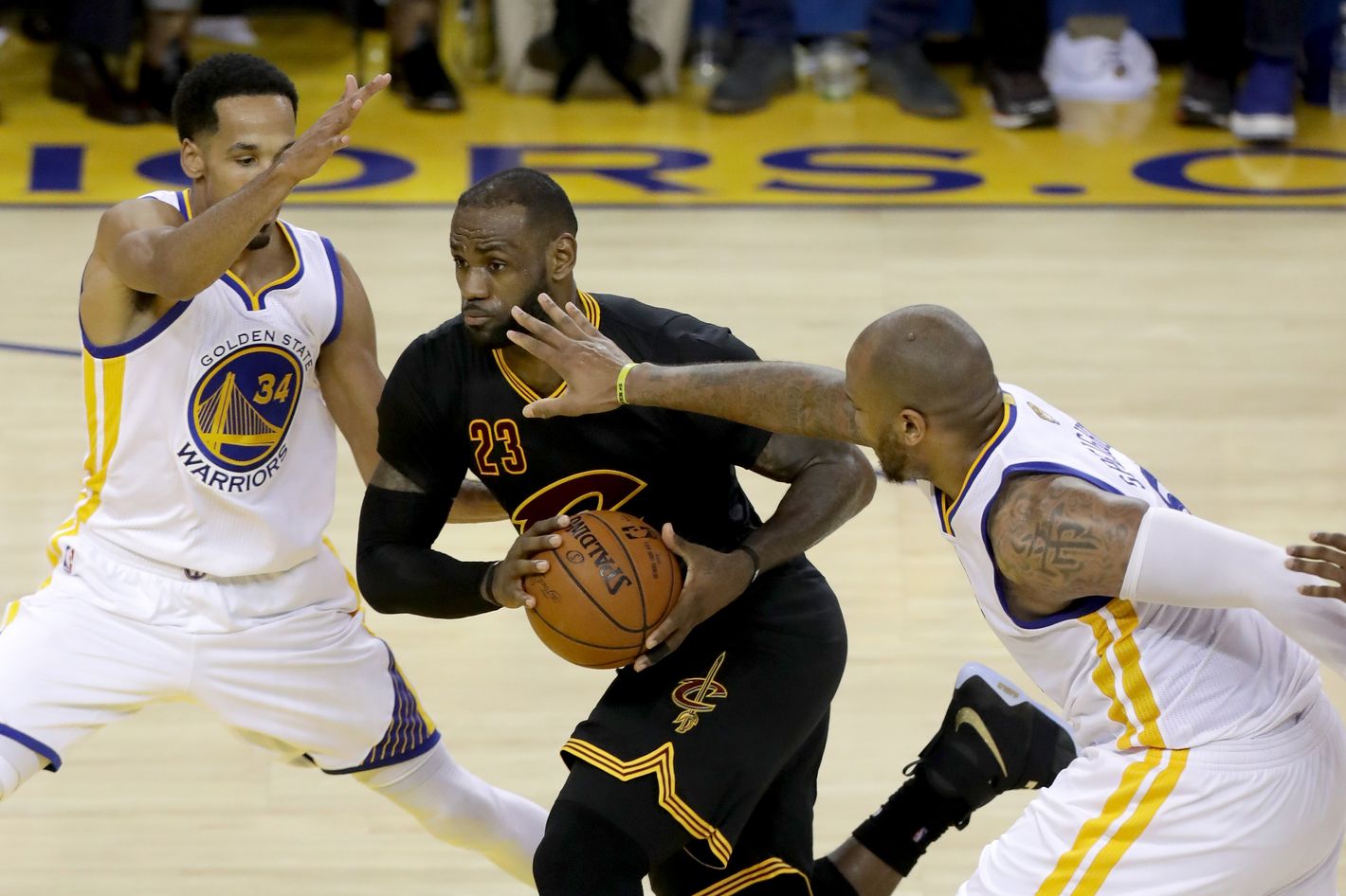 The Latest: Cavaliers, Warriors tied 61-61 at halftime