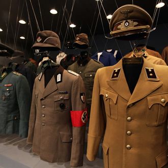BERLIN - OCTOBER 13: Uniforms of Nazi criminal Adolf Hitler and his regime are pictured during a press preview of 'Hitler and the Germans Nation and Crime' (Hitler und die Deutschen Volksgemeinschaft und Verbrechen) at Deutsches Historisches Museum (German Historical Museum) on October 13, 2010 in Berlin, Germany. The exhibition seeks to answer the question of why so many Germans chose to follow Hitler and his fascist ideology and so devotedly despite the horrors of World War II and the Holocaust. The exhibition will be open to the public from October 15 until February 6, 2011. (Photo by Andreas Rentz/Getty Images)