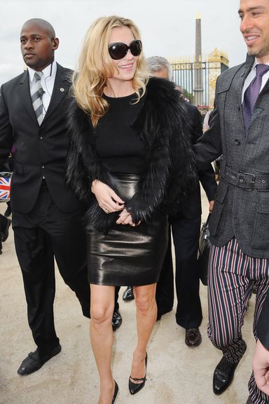 PARIS - OCTOBER 01:  Kate Moss arrives for the Christian Dior Ready to Wear Spring/Summer 2011 show during Paris Fashion Week at Espace Ephemere Tuileries on October 1, 2010 in Paris, France.  (Photo by Francois Durand/Getty Images)