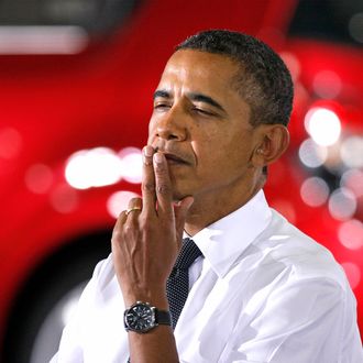 LAKE ORION, MI - OCTOBER 14: U.S. President Barack Obama listens to South Korean President Lee Myung-bak (not pictured) speak at General Motors' Orion Assembly Plant October 15, 2011 in Lake Orion, Michigan. Obama and Lee visited the plant to promote a free trade agreement. (Photo by Bill Pugliano/Getty Images)