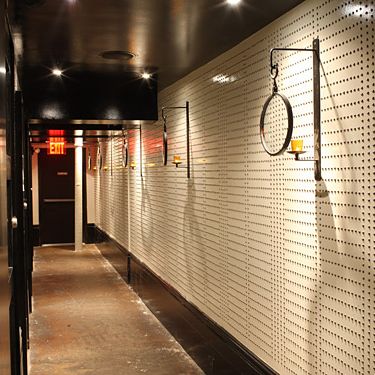 Nickel-plated nails studding the walls.