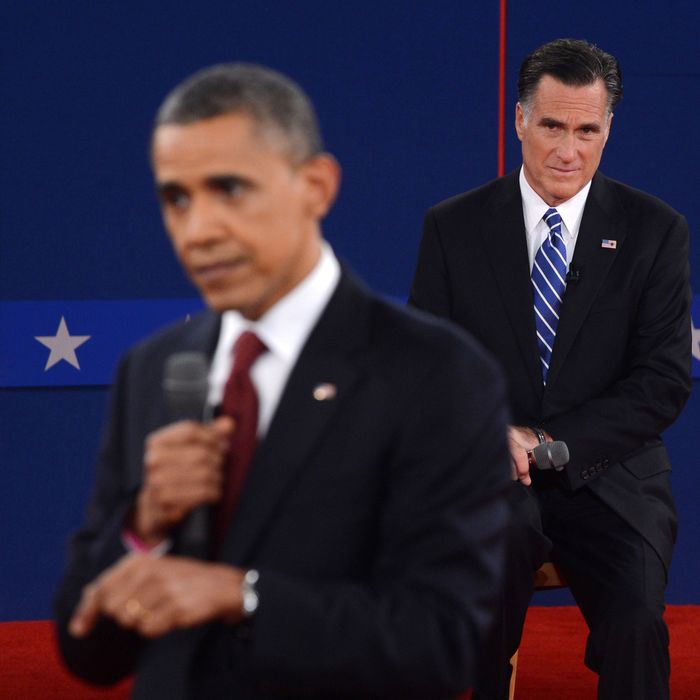 US President Barack Obama (L) and Republican presidential candidate Mitt Romney (R) participate in the second presidential debate, the only held in a townhall format, at the David Mack Center at Hofstra University in Hempstead, New York, October 16, 2012, moderated by CNN's Candy Crowley. 