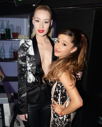 AMSTERDAM, NETHERLANDS - NOVEMBER 10: (EXCLUSIVE COVERAGE) (L-R) Iggy Azalea and Ariana Grande pose in the VIP Glamour Pit during the MTV EMA's 2013 at the Ziggo Dome on November 10, 2013 in Amsterdam, Netherlands. (Photo by Dave Hogan/MTV 2013/Getty Images for MTV)