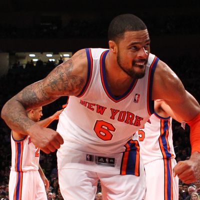 Tyson Chandler #6 of the New York Knicks celebrates a basket against the New Jersey Nets during their pre season game at Madison Square Garden on December 21, 2011 in New York City.
