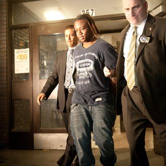 Nov. 11, 2013 - Manhattan, New York, U.S. - COREY DUNTON, 16, of the Bronx, the suspect in the Bryant Park shooting that left two wounded is escorted by detectives from the Midtown South Precinct, Monday, November 11, 2013. COREY DUNTON is expected to be arraigned later tonight. (Credit Image: ? Bryan Smith/ZUMAPRESS.com)