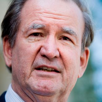 Pat Buchanan speaks about Tim Russert to reporters outside NBC's bureau June 15, 2008 in Washington, DC. 