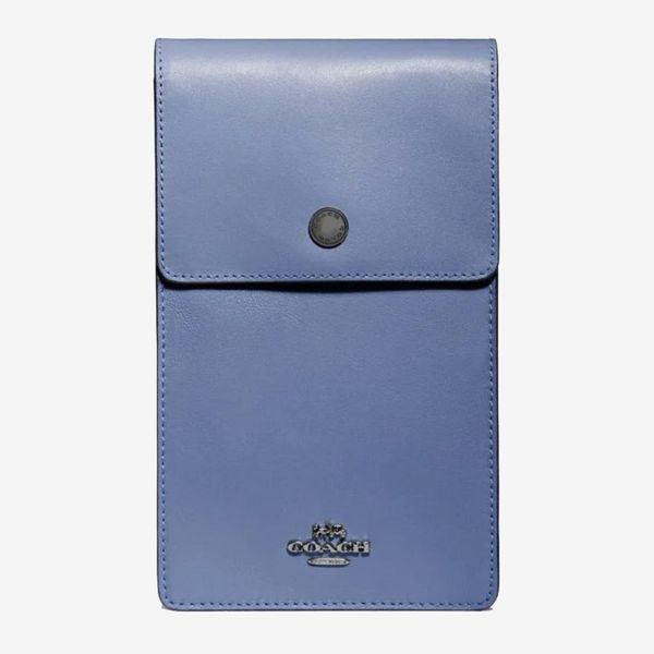 The phone-sized Coach snap-close crossbody bag in subtle blue with a silver Coach logo on the front. The Strategist - 48 Things on Sale You’ll Actually Want to Buy: From Sunday Riley to Patagonia