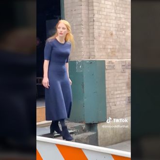 Chastain-as-Nora's exit onto 45th Street.