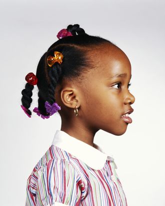 She braids kids hair for free when their parents can't afford it